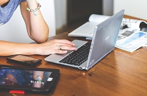 person working remortly on computer